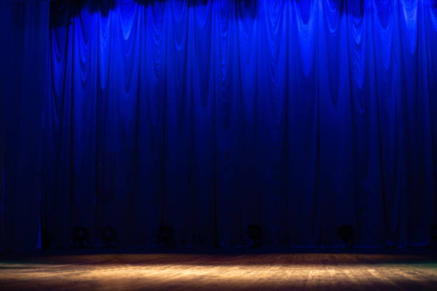 istock Stage before a performance, a curtain in a concert hall or theater. 1262418649