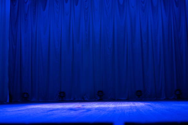 istock Stage before a performance, a curtain in a concert hall or theater. 1262418675