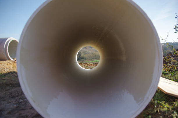 Fast response repair team builders replacing damaged foul sewer drainage pipe
