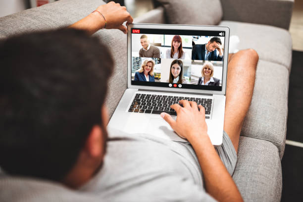 istock man doing a videoacall on the sofa 1262423394