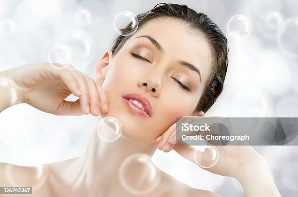 Portrait Of A Young Woman With Closed Eyes And Bubbles Stock Photo - Download Image Now