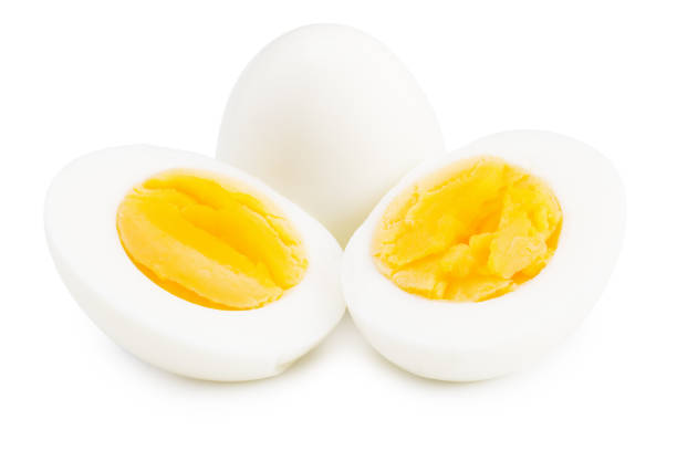 istock Single whole boiled egg with halved egg isolated on a white background 1262424135