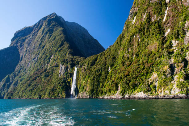 Waterfalls at Milford Sound Waterfalls at Milford Sound, Fiordland, New Zealand milford sound stock pictures, royalty-free photos & images