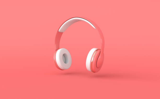 istock Headphones realistic 3d render. Music lover minimalistic background with pink and white wireless audio earphones 1262434068