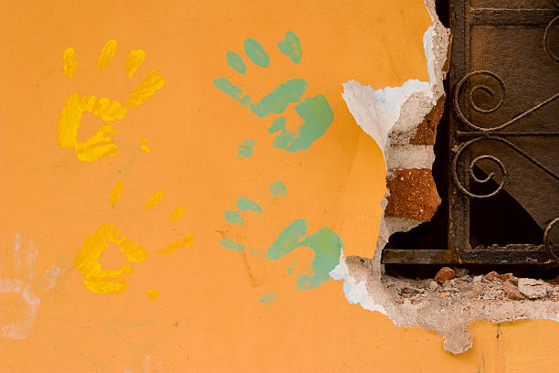 istock Hand Prints on Orange Wall, Paint, Urban Art, Grunge 126243601