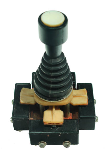 istock Old joystick made of four push buttons and a handle, isolated against white background 1262449889