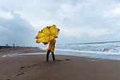 Man on stormy beach