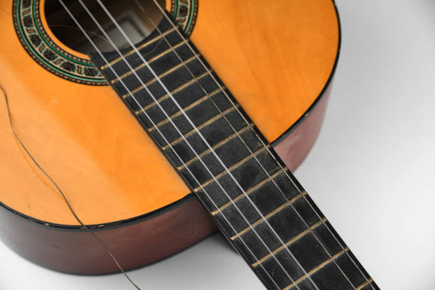 istock Dusty, neglected, classical guitar details 1262451174