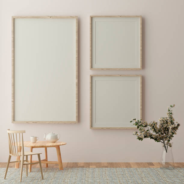 istock three vertical white frame mock up, wooden frame and chairs on yellow wall, 3d illustration 1262478624