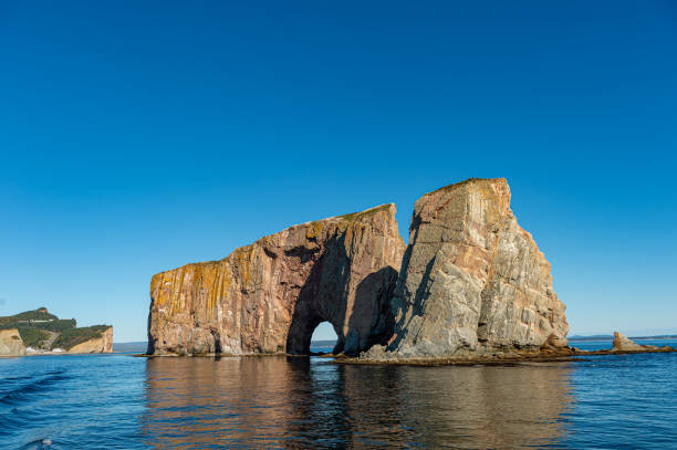 Rocher Perce rock in Gaspe Peninsula, Quebec, Gaspesie Rocher Perce rock in Gaspe Peninsula, Quebec, Gaspesie, Canada gaspe peninsula stock pictures, royalty-free photos & images
