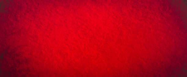 istock blurred red abstract grunge paper background texture with Christmas background 1262491243