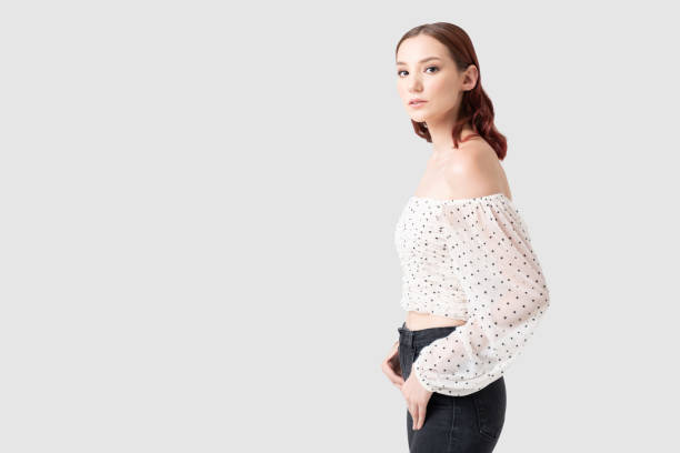 istock Confident Caucasian Woman Wearing Off Shoulder Top 1262497213
