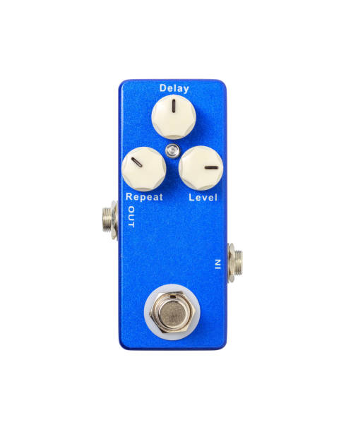 istock Stomp box electric guitar signal delay effects foot pedal isolated on white background with clipping path. 1262499582