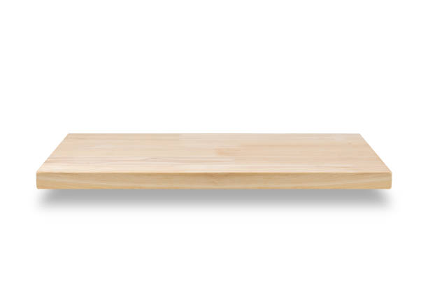 istock Empty wood shelf isolated on white background, Light wooden tabletop or shelf isolated on white background. 1262499586