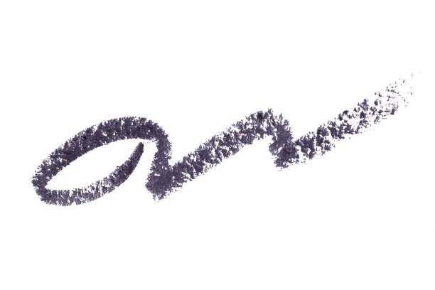 istock Eyeliner swatch color stroke isolated on white background. Eye pencil black squiggle texture. 1262522161