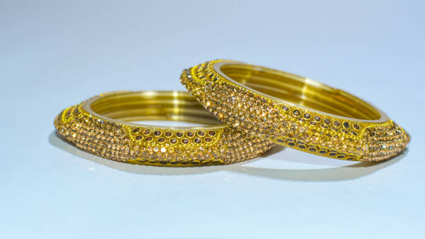 istock Metal & Glass Bangles With Colourful Stone Work on White Background. 1262533794