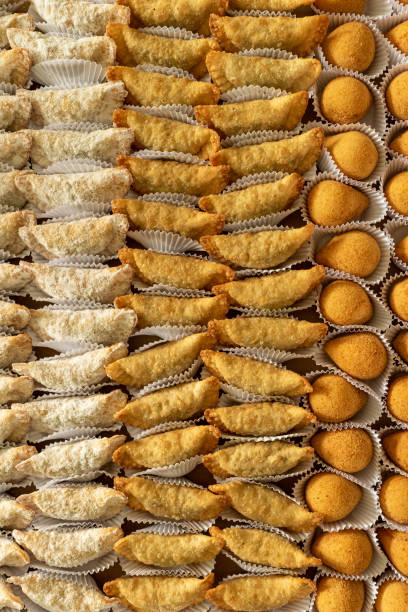 istock Brazilian gastronomy. Various snacks, such as pastries, chicken drumsticks and risoles. 1262540739