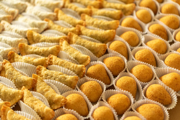 istock Brazilian gastronomy. Various snacks, such as pastries, chicken drumsticks and risoles. 1262540744