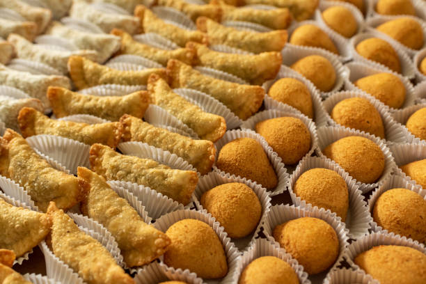 istock Brazilian gastronomy. Various snacks, such as pastries, chicken drumsticks and risoles. 1262540764