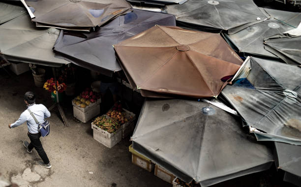 istock Umbrella in Dam Market 1262542733