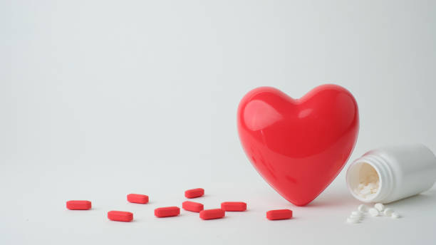 istock red heart on white background with the medicine 1262560422