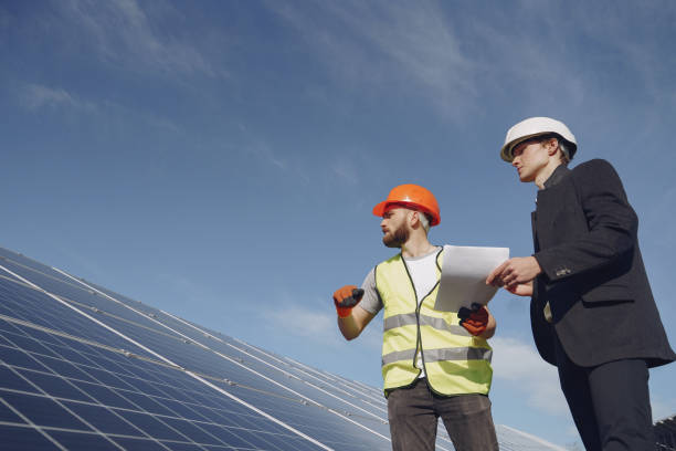 istock Foreman and businessman at solar energy station 1262562551