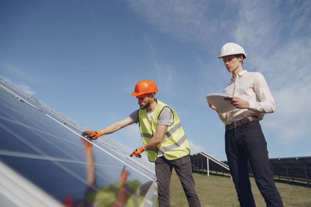 istock Foreman and businessman at solar energy station 1262563122