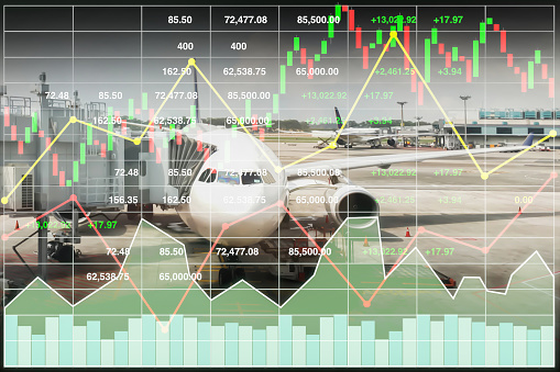 Stock index financial data presentation for travel business and transportation industry with graph and chart on aircraft background.