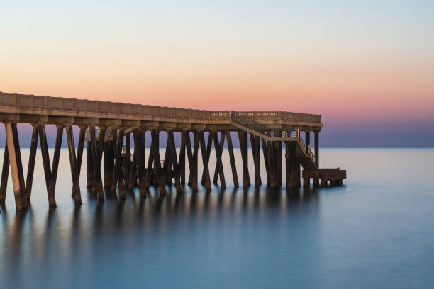 istock Sea pier with long exposure water 1262574494