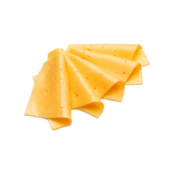 istock cheese slices isolated on white background cutout 1262575176