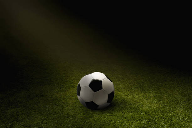 istock Soccer ball on a playing field 1262578015