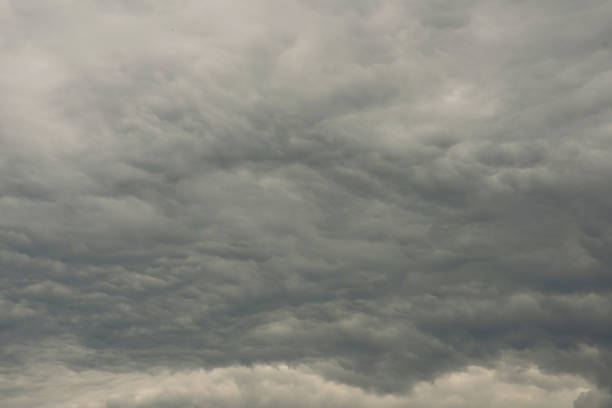 istock Dark clouds on sky before rainy and storm 1262582342