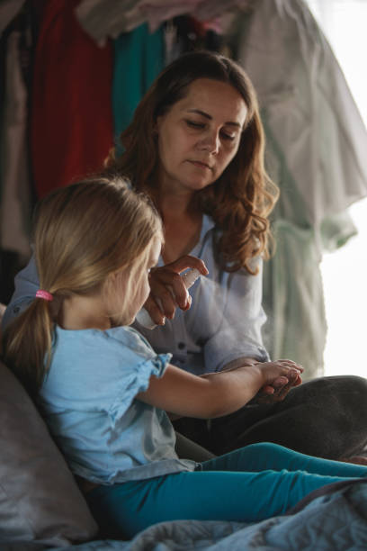 istock Little girl learning about illness prevention with her mother 1262583263