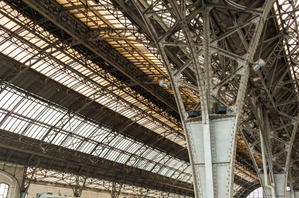 istock Old European train station with a platform. Arch metal train station. 1262584834