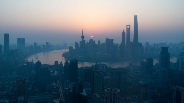 istock Sun rising above the Shanghai skyline 1262585593