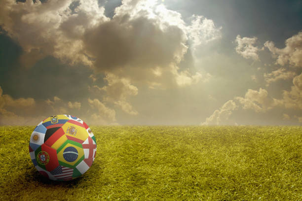 istock World flags soccer ball on a playing field 1262587128
