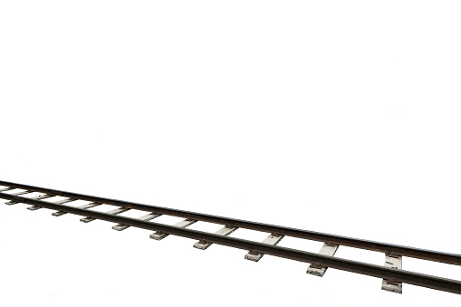 Railway tracks running diagonally through the picture over white background
