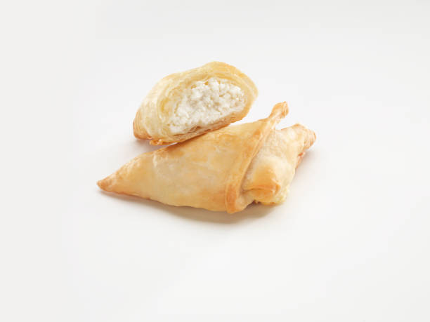 istock Isolated Turkish borek rolls with cheese on a white background. A traditional Turkish pastry, muska borek. 1262595664