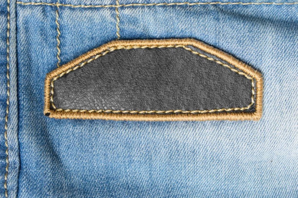 leeres lederetikett - leather patch denim jeans stock-fotos und bilder