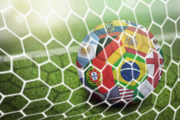 istock World flags soccer ball in goal net 1262596418