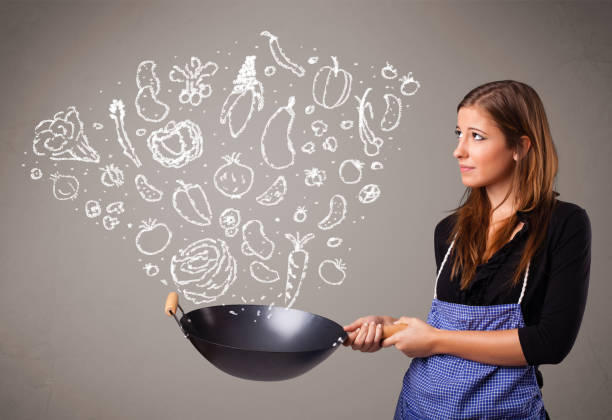 istock Woman cooking vegetables 1262597010