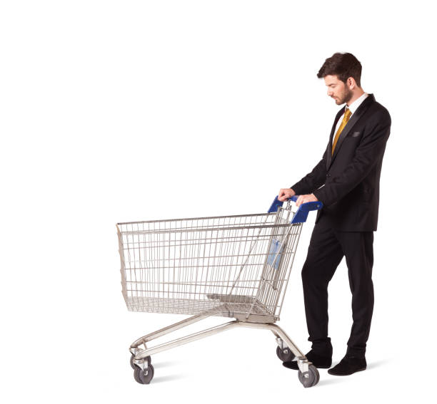istock Businessman with shopping cart 1262598047