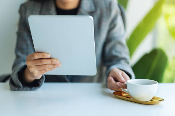 istock a business woman using digital tablet in office 1262598347
