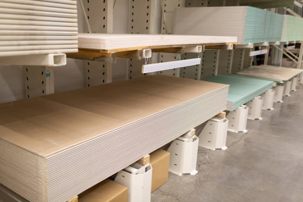 istock Pallet with Drywall sheets plasterboard in the building warehouse store. 1262605421