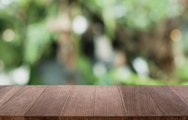 istock Wood Table Top in Blur Background room interior with empty copy space. 1262605670