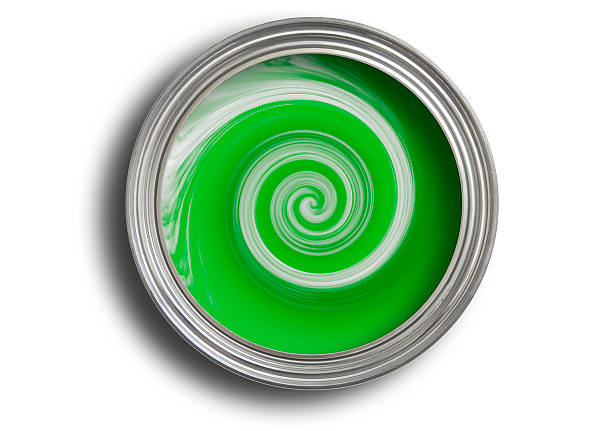istock Tin of green paint being mixed on white with path 126260937