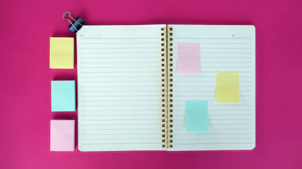Open blank journal on pink background. Concept for creative person planning. Back to school. Top view, flat lay, mockup Open blank journal on pink background. Concept for creative person planning. Back to school. Top view, flat lay, mockup. bullet journal photos stock pictures, royalty-free photos & images
