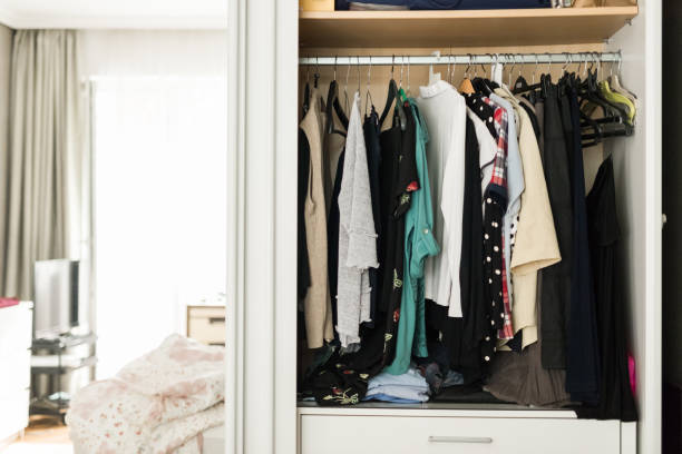 istock The wardrobe is tidying up, making the bed 1262615205