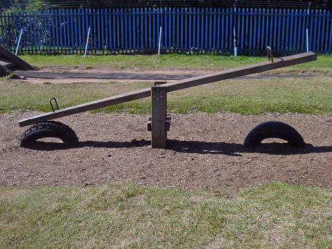 Childs Seesaw with rubber tyres at the playground