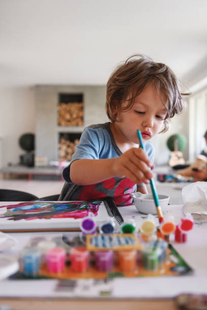 istock Three years little boy doing painting 1262618580